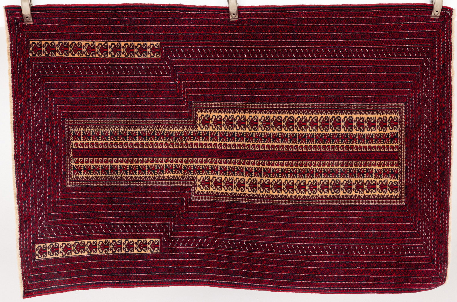 Small Red Persian Prayer Rug: Property from the Estate of Arthur B. Kouwenhoven Jr., Savannah, GADescription: Small Red Persian Prayer Rug, in tones of cream, blue, and black on a red ground.Measurements: Length: 53 in. x Width: