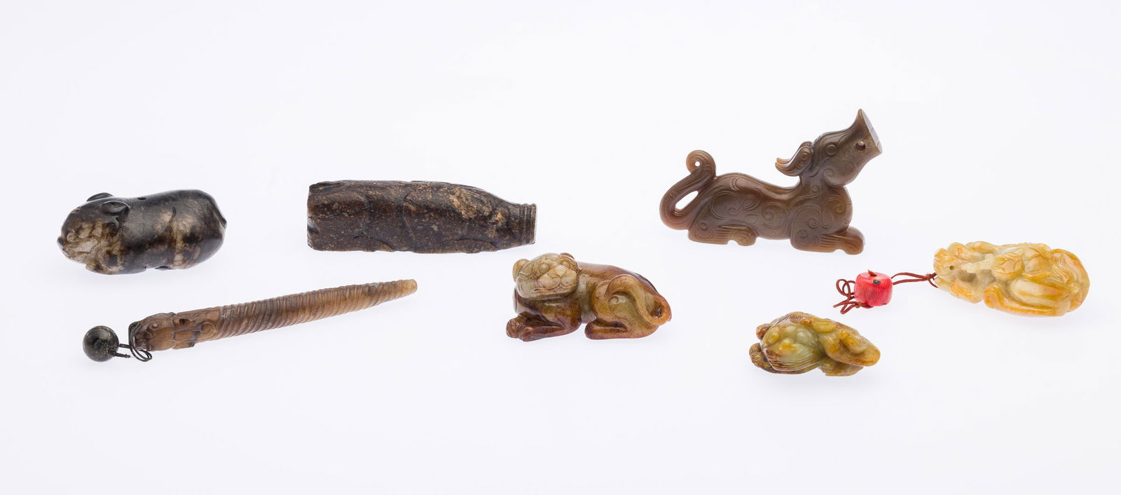 Seven Chinese Carved Hardstone Animals and Pendants (1 of 11)