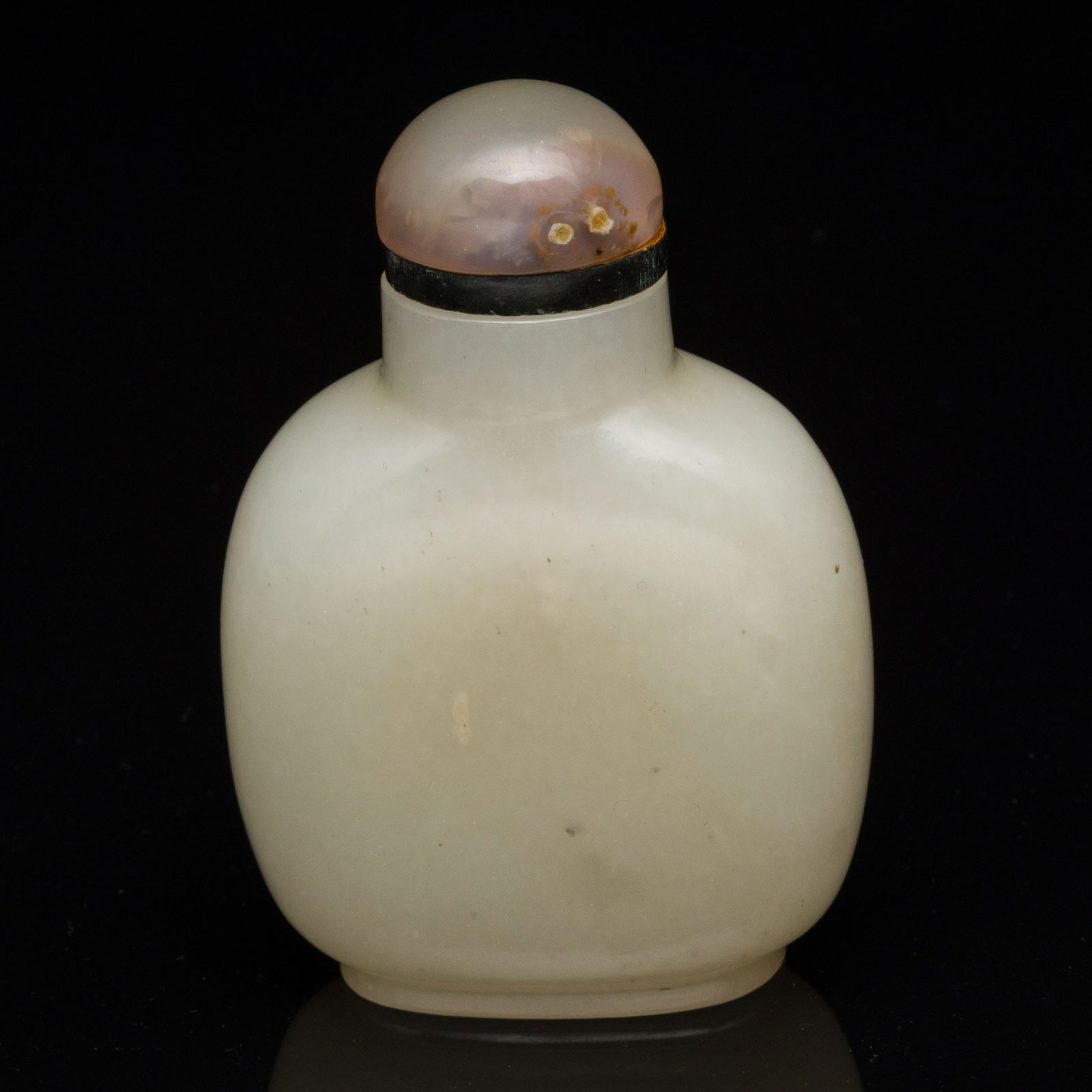 Chinese White Jade Snuff Bottle: Property from the Estate of Arthur B. Kouwenhoven Jr., Savannah, GA Description: Chinese White Jade Snuff Bottle, white jade snuff bottle with gray stone lid, unmarked. Measurements: