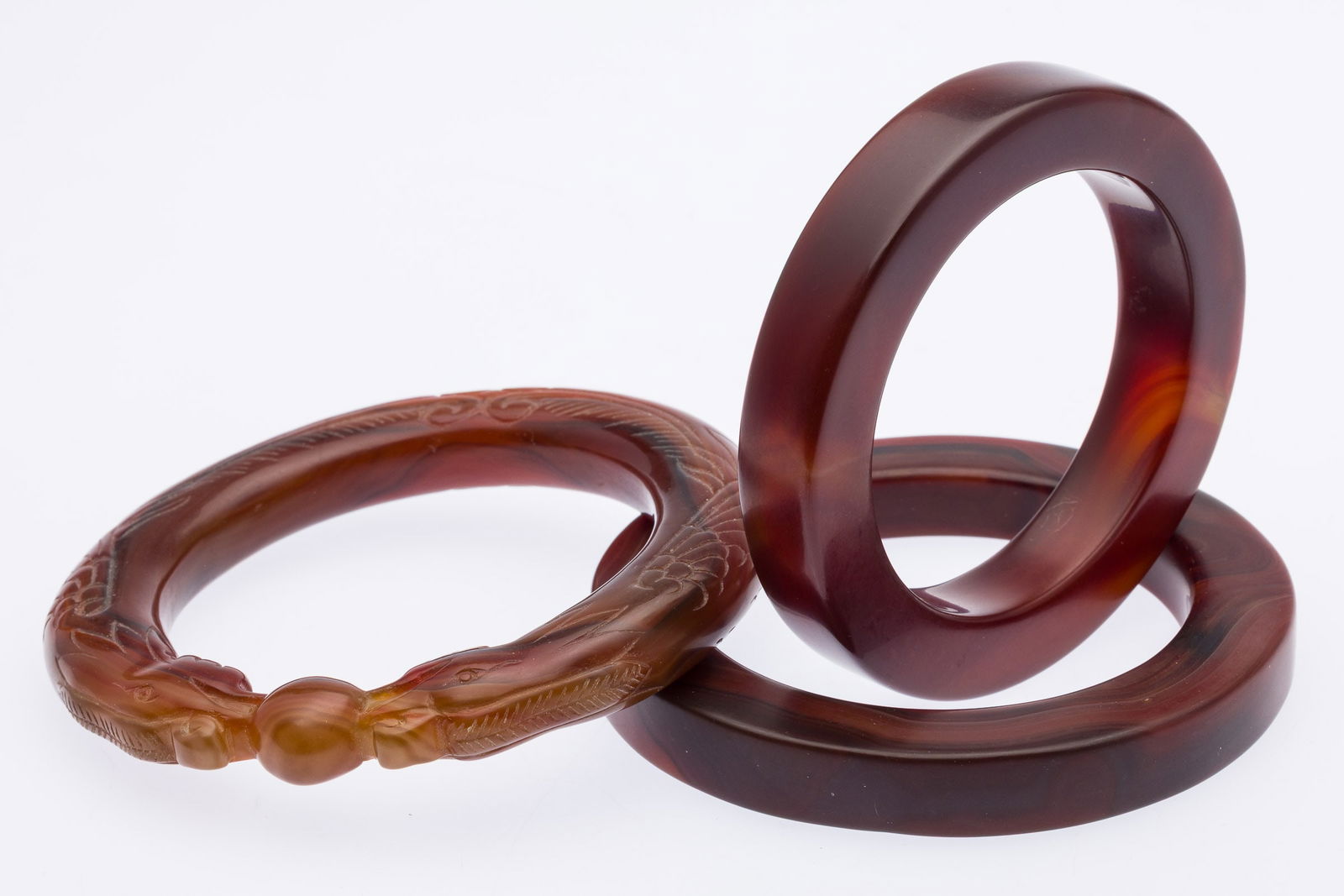 Three Carved Red Stone Bracelets (1 of 9)