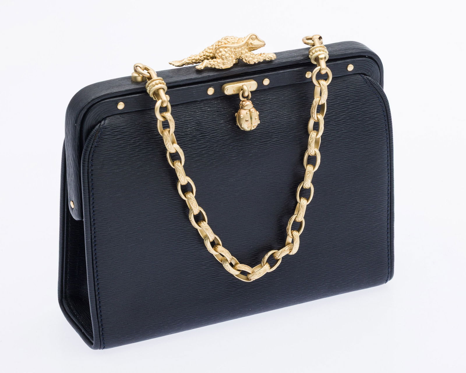 Barry Kieselstein Navy Blue Purse with Frog Closure: Property from a Private Collection, St. Simons Island, GADescription: Barry Kieselstein-Cord Navy Blue Purse with Frog Closure, of textured navy blue leather, with soft gold-tone chain strap and frog