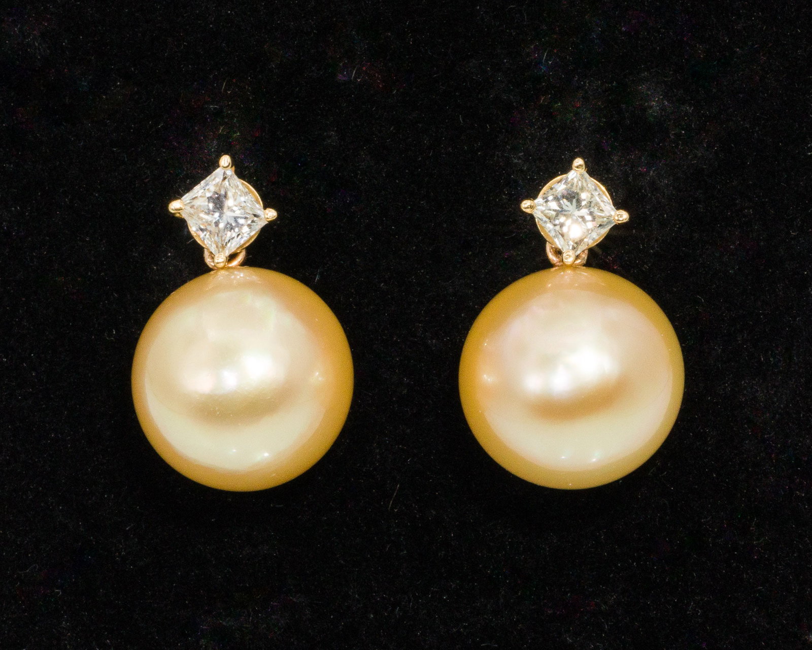 Golden South Sea Pearl, Diamond and 18K Earrings: Description: Golden South Sea Pearl, Diamond and 18K Earrings, 18K yellow gold earrings featuring golden south sea pearl drops (approx. 13 mm) and princess cut diamonds (approx. 0.80 cts total, G-H,