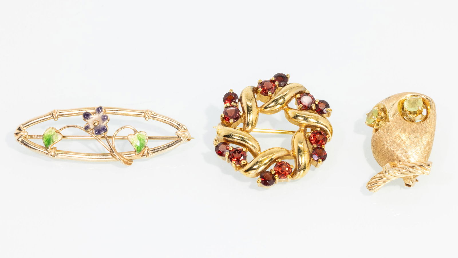 Three 10K and 14K Gold Pins with Peridot and Garnet (1 of 4)