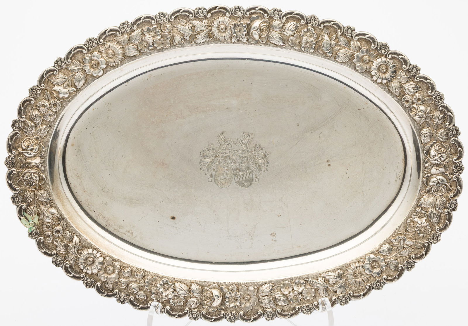 Schultze Sterling Repousse Oval Serving Platter: Property from a Private Collection, Savannah, GADescription: Schultze Sterling Silver Repousse Oval Serving Platter, engraved with central armorial with repousse rim. 17.9 troy ounces.Measurements: