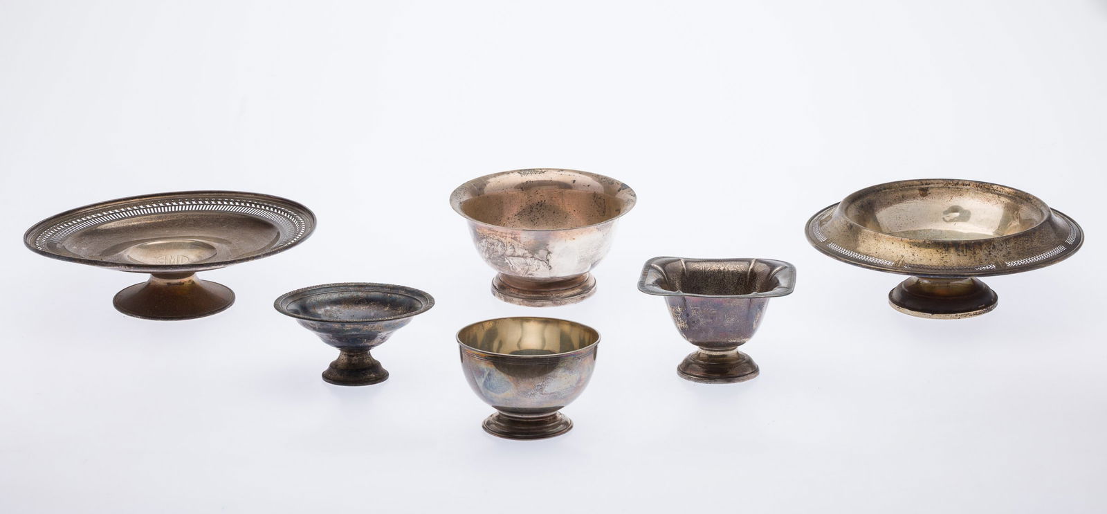 6 Sterling Silver Footed Table Articles: Property from a Private Collection, Savannah, GADescription: 6 Sterling Silver Footed Table Articles, comprising 2 weighted bowls (one marked Hamilton) and a weighted monogrammed compote, 2 small