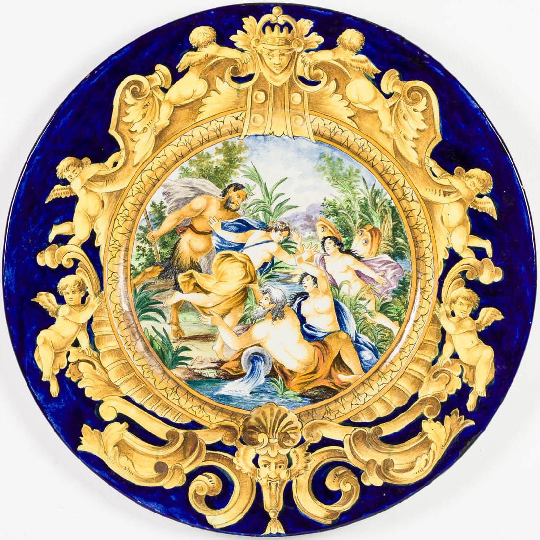 Italian Majolica Charger with Mythological Scene: Property from a Private Collection, New York City Description: Italian Majolica Charger with Mythological Scene, the figures within a cartouche and blue surround. Measurements: