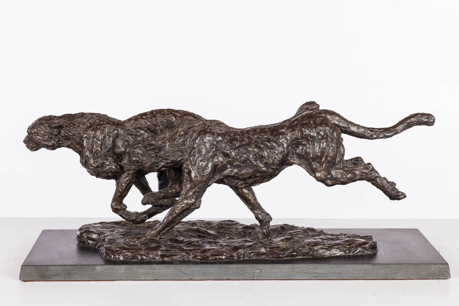 William Timym (1903-1990), Cheetahs, Bronze: Property from a Private Collection, Savannah, GA Description: William Timym (Austria/England, 1903-1990), Cheetahs, Bronze, signed and numbered 76/100 on base of bronze, depicting two running chee