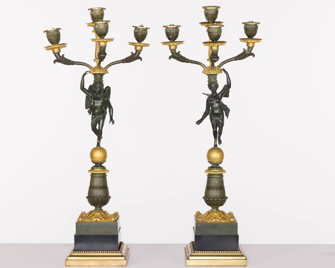 Pair of Empire Style Four Light Candelabra, 19th C: Property from a Private Collection, New York City Description: Pair of Empire Style Bronze and Gilt Metal Four Light Candelabra, 19th C, each with winged figure issuing 4 candlearms on a square ba