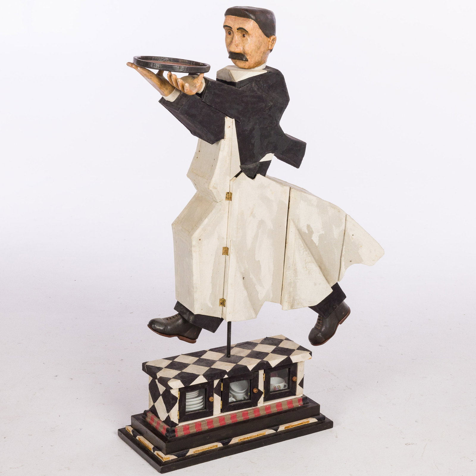 Harvey Peterson (Seattle, 20 C) Waiter, Mixed Media: Description: Harvey Peterson (Seattle, WA, 20th Century), Waiter Sculpture, Mixed Media, signed on back of neck, the figure's apron with hinged flaps, one flap opening to mixed media fork and spoon