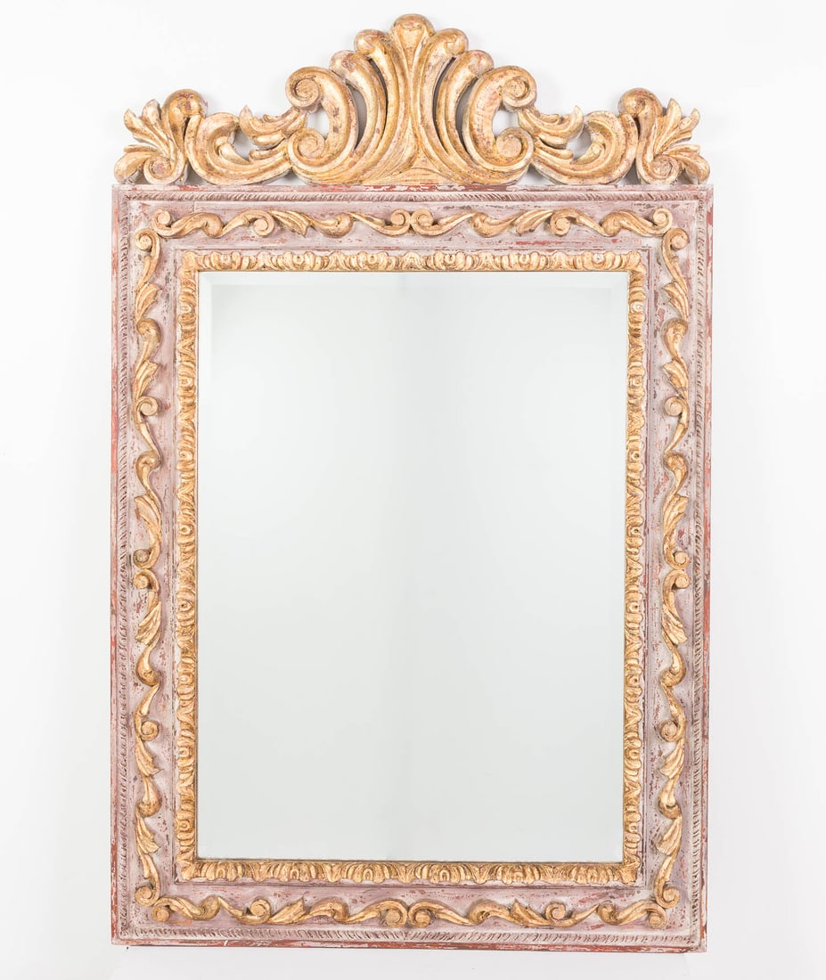 San Miguel Trading Company Carved Wood Mirror: Property of a Private Collector, St. Helena Island, SC Description: San Miguel Trading Company Carved Wood Mirror, the rectangular mirror plate surmounted by a C-scroll carved gilt crest.