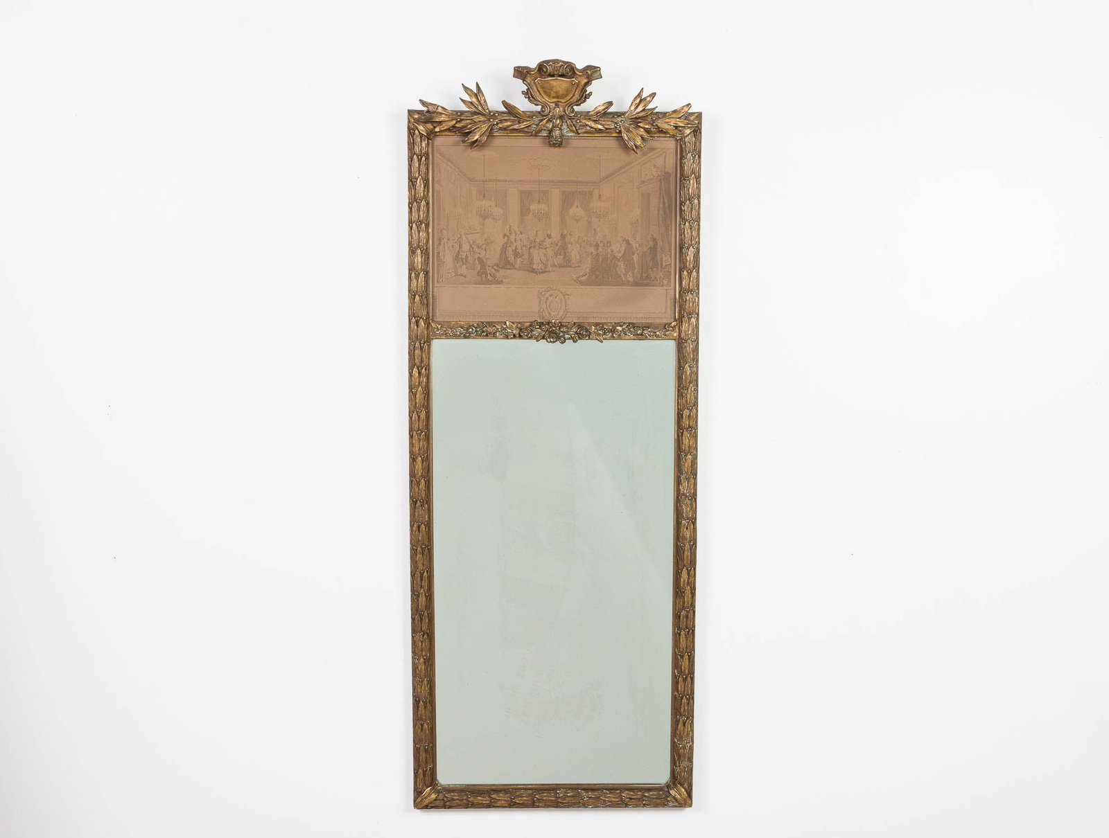 Louis XVI-style Small Trumeau Mirror, 19th C: Property from a Private Collection, New York City Description: Louis XVI-style Small Trumeau Mirror, 19th C, the rectangular mirror plate surmounted with a print and with carved and gilt foliate