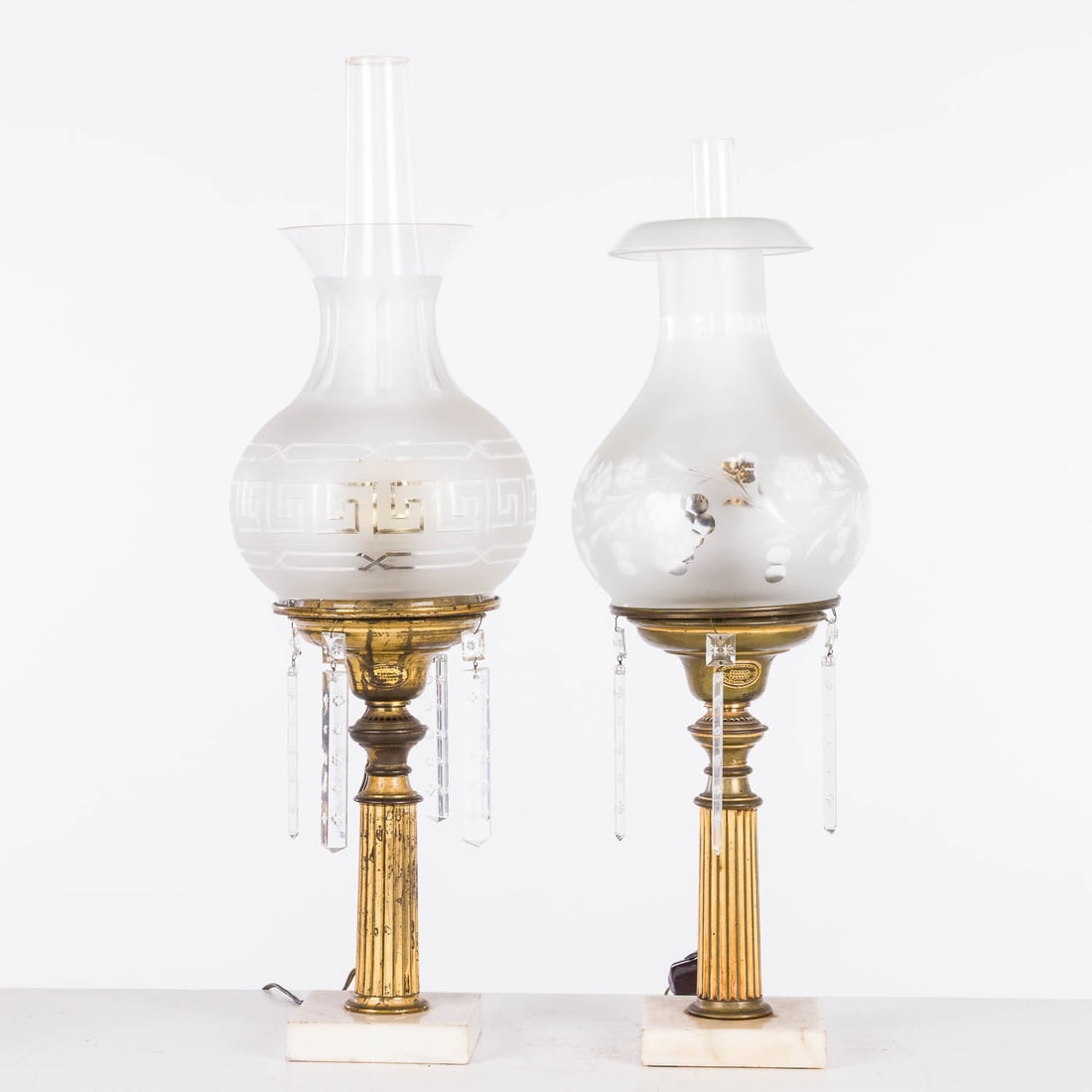 Two American Cornelius & Co Oil Lamps, 19th C: Property of Bliss Hebert and Allen Charles Klein Description: Two American Cornelius & Co Oil Lamps, 19th C, two American Cornelius and Company brass, marble and glass oil lamps, with frosted and
