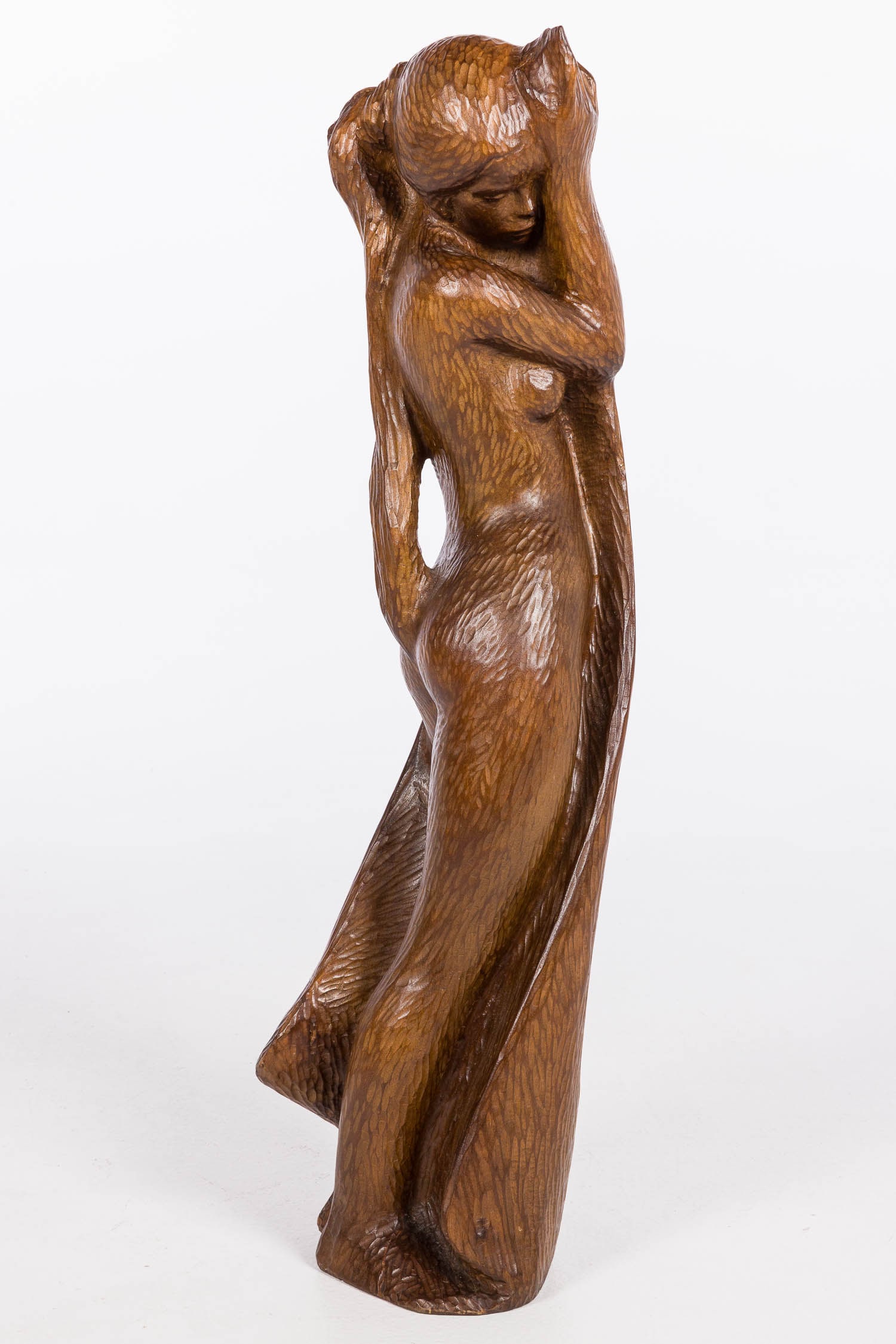 Michel Bonnand (French, b 1935) Sculpture of a Woman: Property from a Private Collection, Savannah, GA Description: Michel Bonnand (French, b. 1935), Carved Wood Sculpture of a Woman, the standing woman with long hair holding a towel, signed lower edge.