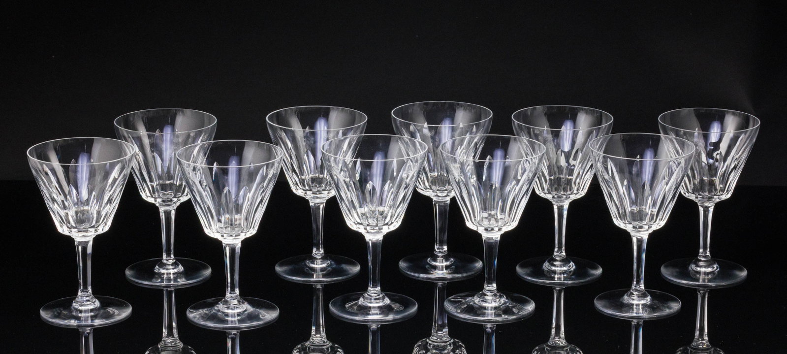 Set of 12 Baccarat Wine Glasses: Property from a Private Collection, Savannah, GA Description: Set of 12 Baccarat Wine Glasses, all marked on bottoms. Measurements: Height: 5 5/8 in.