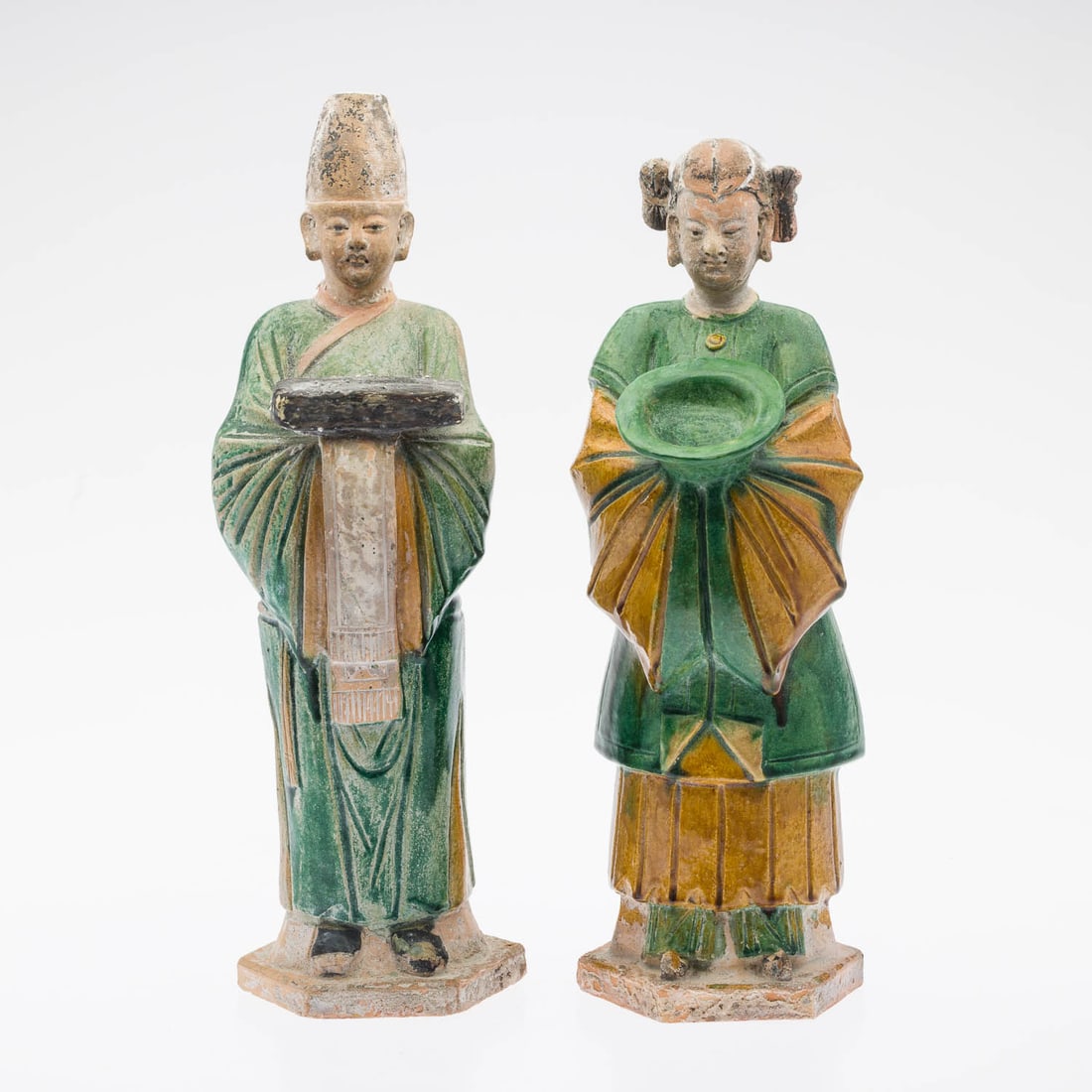 2 Chinese Sancai Tomb Figures, Probably Ming Dynasty: Property of a Private Collector, Savannah, GA Description: Two Chinese Sancai Tomb Figures, Probably Ming Dynasty, the female figure holding a green bowl, the male figure holds a dark box, both ar
