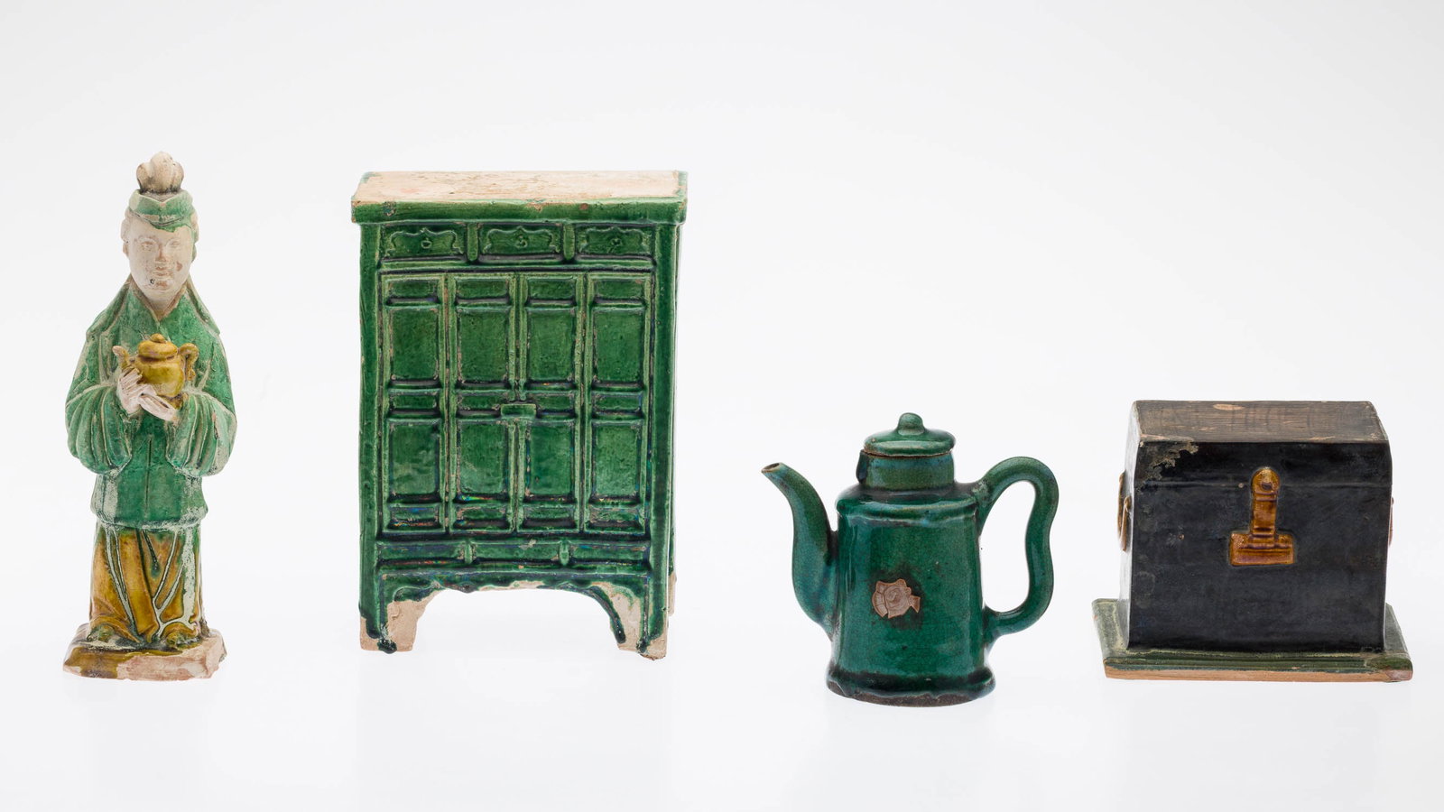 Small Chinese Tomb Figure, Teapot, Box and Chest: Property of a Private Collector, Savannah, GA Description: Small Chinese Tomb Figure, Teapot, Box and Chest, comprising a 9 in. tall ceramic tomb figure (wear to edges, craquelure, surface dirt, m