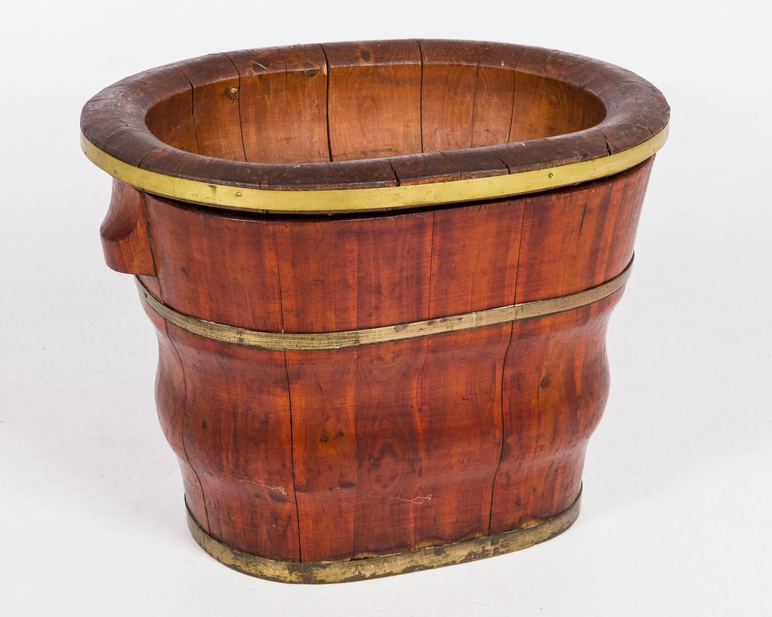 Chinese Softwood Brass Mounted Baby Bath, 19th C: Property of a Private Collector, Savannah, GA Description: Chinese Softwood Brass mounted Baby Bath, 19th Century, with removable center section and carrying handles. Measurements: Height: 15 in. x