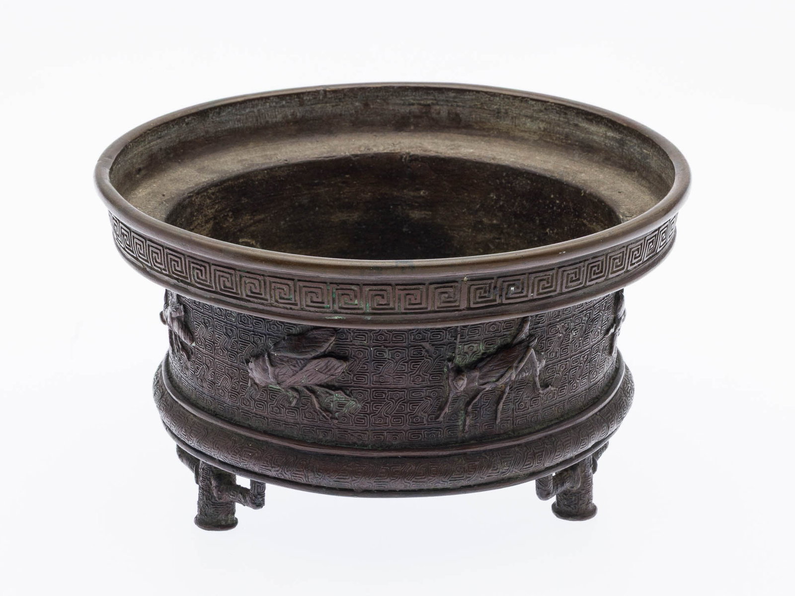 Japanese Bronze Censer, 19th Century: Property of a Private Collector, Savannah, GA Description: Japanese Bronze Censer, 19th Century, tripod censer decorated with insects and repeating Greek key motif, marked on bottom. Measurements: