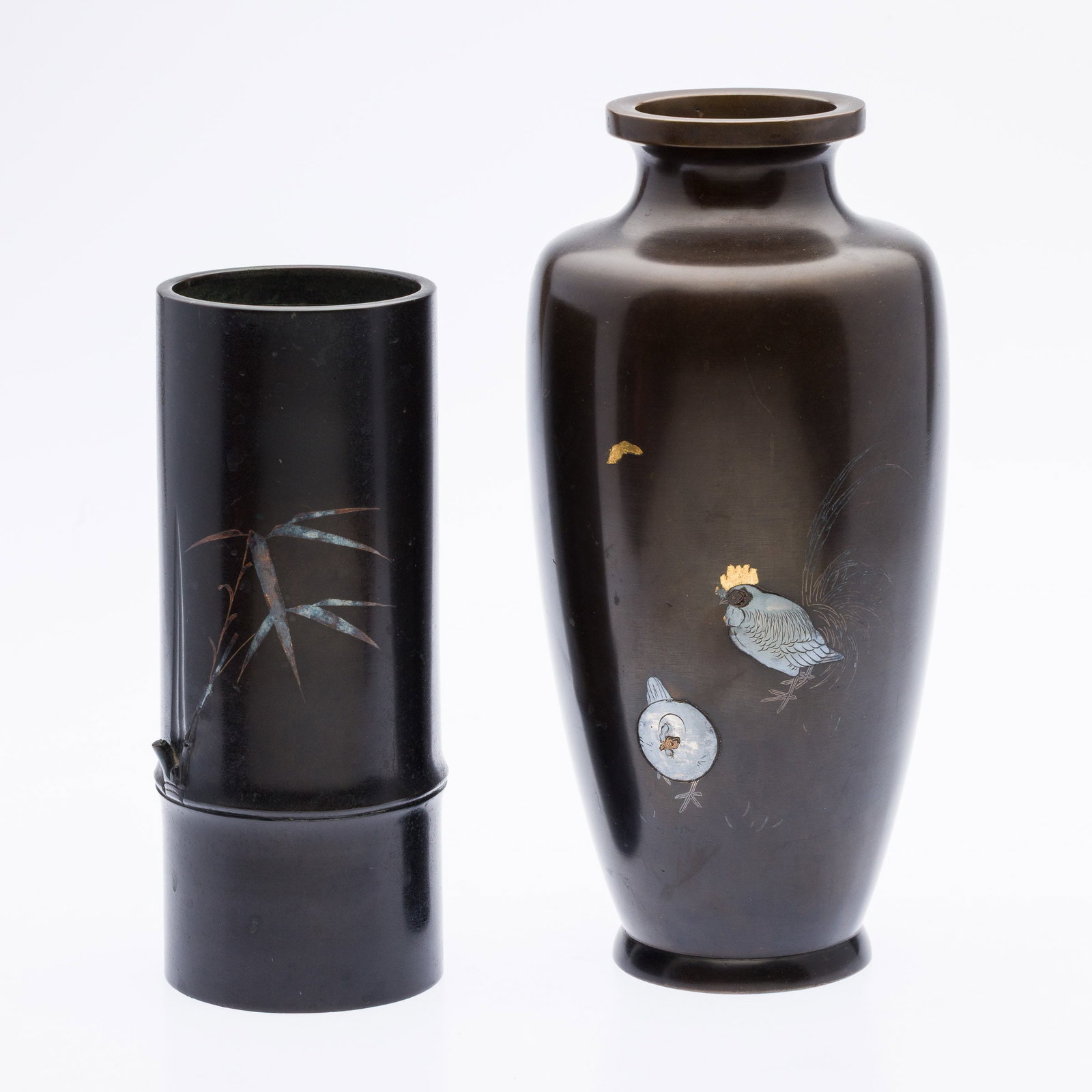 Two Japanese Bronze Vases: Property from the Estate of Arthur B. Kouwenhoven Jr., Savannah, GA Description: Two Japanese Bronze Vases, one vase decorated with two chickens, the other with bamboo branch design and shape, bot