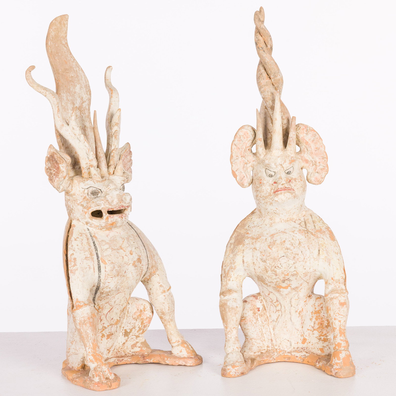 Two Tang Dynasty Guardian Tomb Figures: Description: Two Tang Dynasty Guardian Tomb Figures, Provenance: Purchased in Hong Kong, Hon Bo Court, 2001. (Provenance documents to be released with the lot). Measurements: Height: 19 in. x Width: