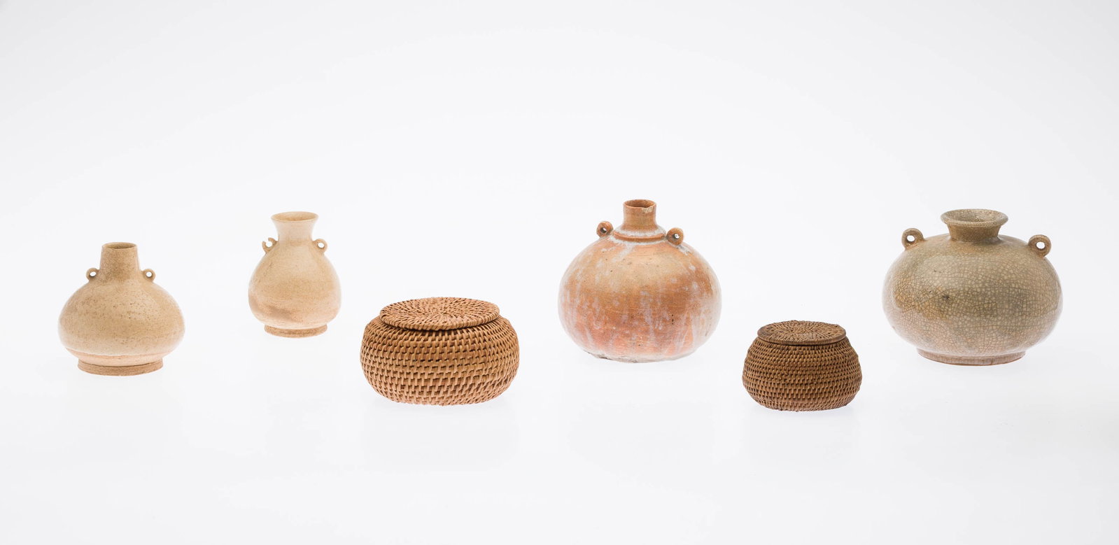4 Thai Pots, 14th Century and Two Woven Baskets: Property of a Private Collector, Savannah, GA Description: 4 Thai Pots, 14th Century and Two Woven Baskets, comprising 4 glazed ceramic pots with circular handles, each with inventory label on