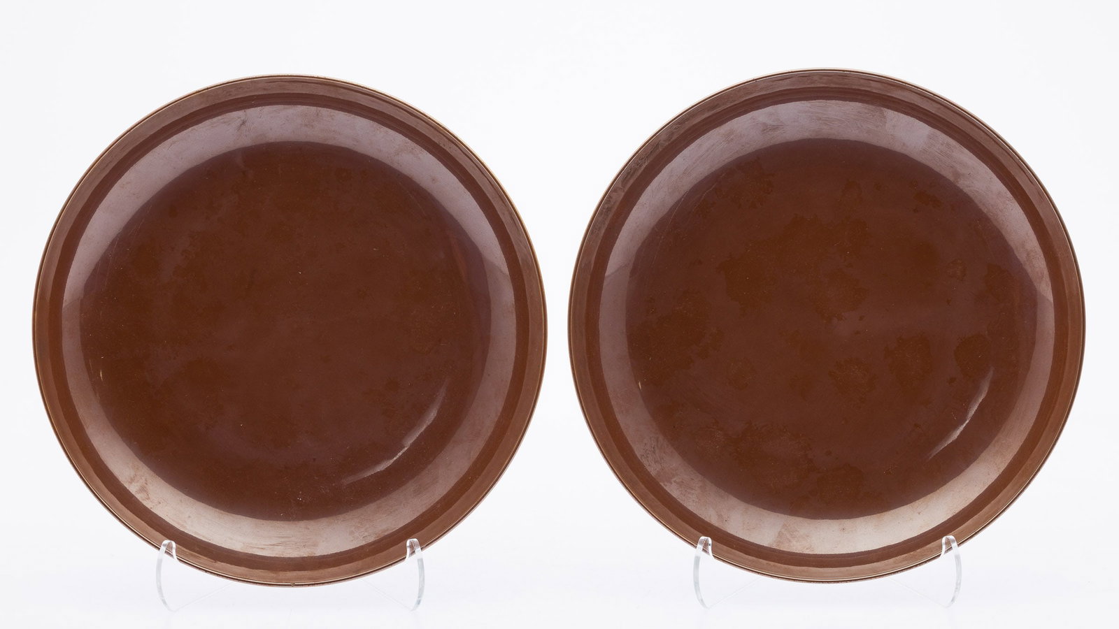 Pair of Chinese Brown Monochrome Plates: Description: Pair of Chinese Brown Monochrome Plates, each marked in blue on underside. Measurements: Height: 1 3/4 in. x Width: 8 7/8 in.