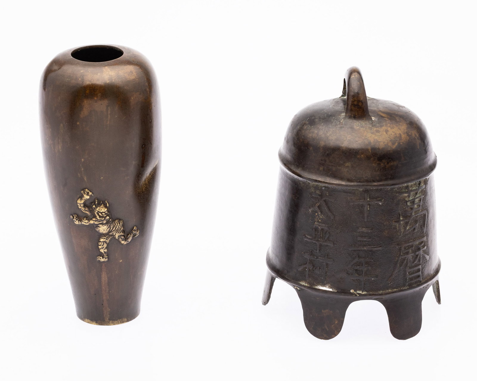 Japanese Bronze Vase and Bronze Bell: Property from the Estate of Arthur B. Kouwenhoven Jr., Savannah, GA Description: Japanese Bronze Vase and Bronze Bell, the vase decorated with guardian figure, the bell with character inscription and