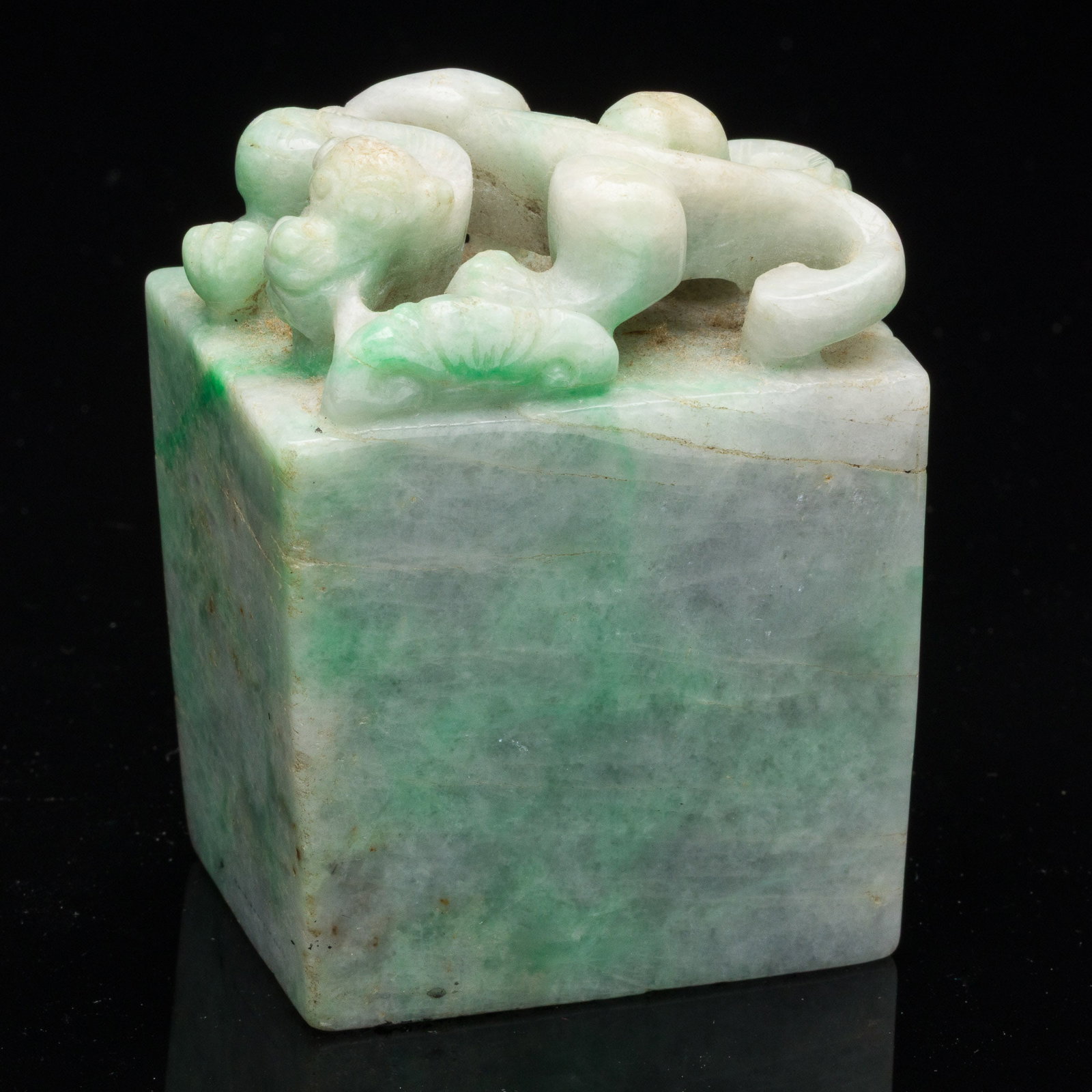 Chinese Carved Jadeite Stamp with Dragon: Property from the Estate of Arthur B. Kouwenhoven Jr., Savannah, GA Description: Chinese Carved Jadeite Stamp with Dragon, with rectangular base surmounted by carved dragon. Measurements: Height: 3