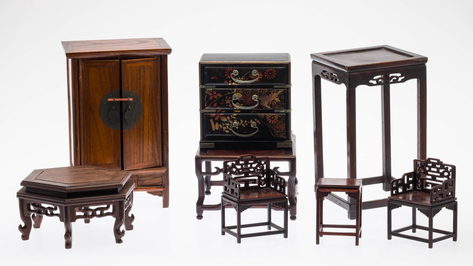 Group of 8 Pieces of Chinese Miniature Furniture: Property of Bliss Hebert and Allen Charles Klein Description: Group of 8 Pieces of Chinese Miniature Furniture, comprising a hexagonal stand, a square stand, a square short pedestal, two armchairs