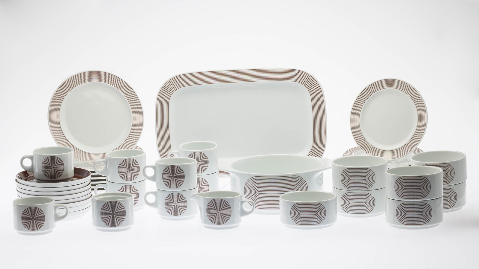 Rosenthal Studio-Linie 'Joy' Coffee Set, 34 pcs.: Description: Rosenthal Studio-Linie 'Joy' Coffee Set, 34 pcs., comprising seven 7 5/8 in. plates, eight 6 1/2 in. plates, 8 teacups, 8 saucers, 7 bowls, cream and sugar, serving bowl, and a recta