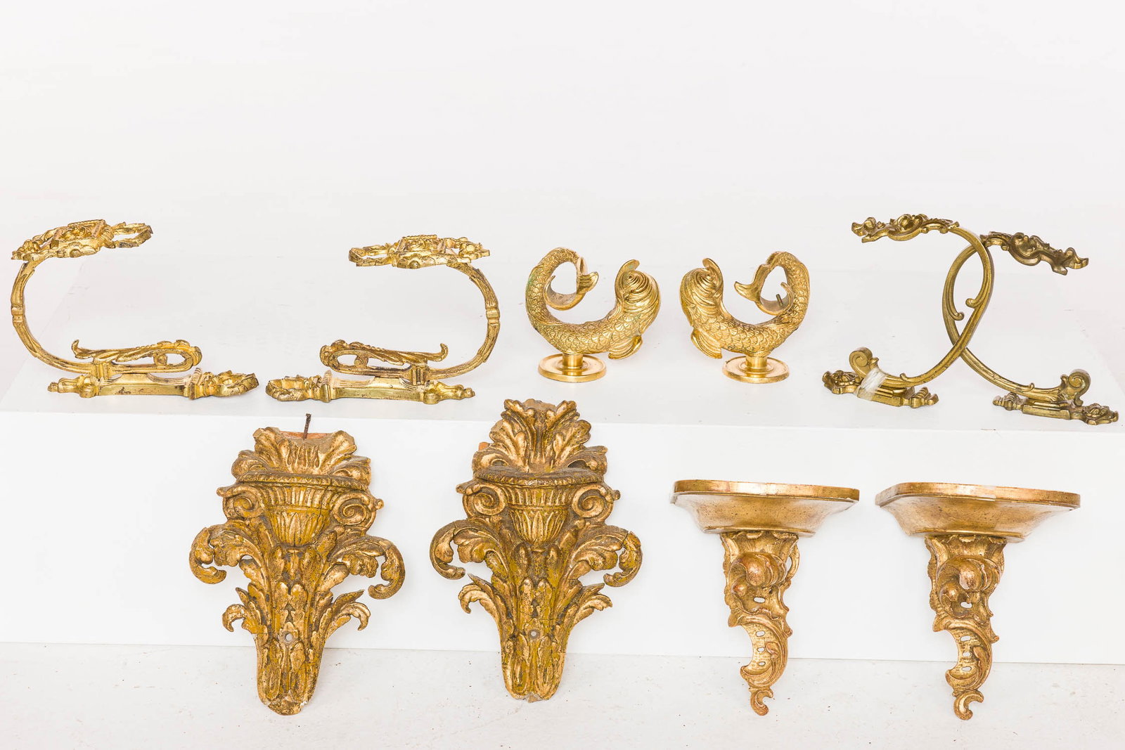 3 Prs Curtain Tiebacks, Pr Wall Brackets & Fragments: Property from a Private Collection, New York City Description: Three Pairs of Curtain Tiebacks, Pair of Wall Brackets and Wall Sconce Fragments, comprising three pairs of gilt metal curtain tiebac