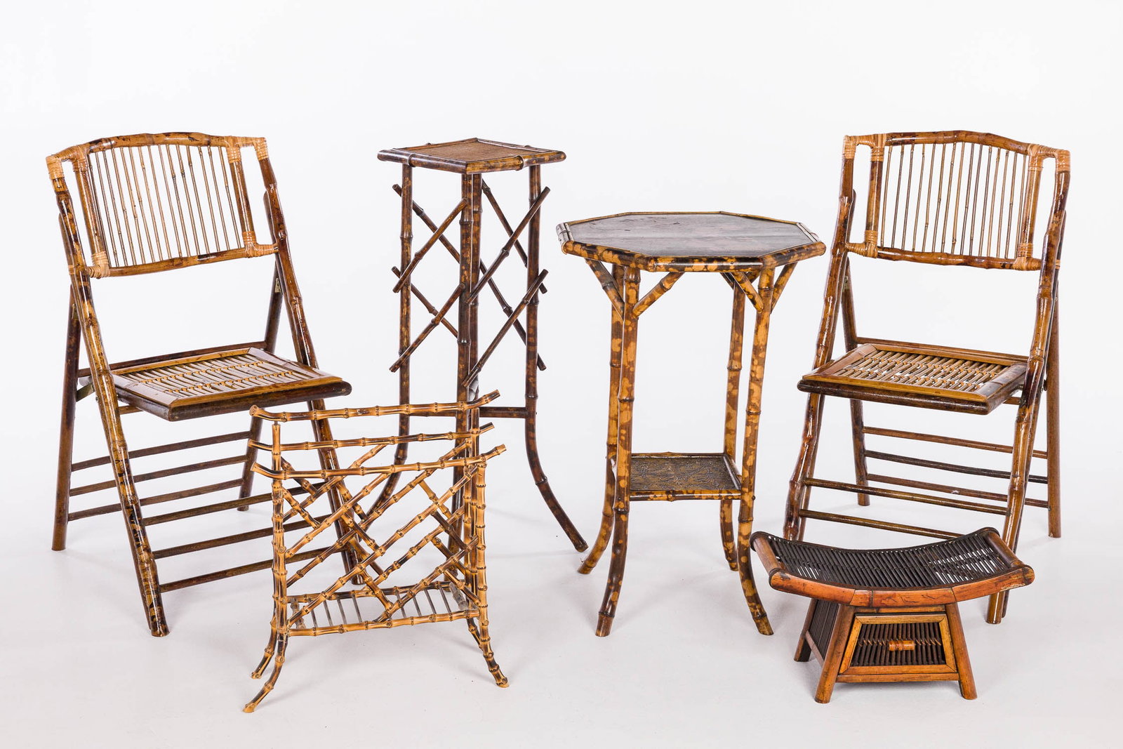 6 Pieces of Bamboo Furniture, 19th C and Later: Property of Bliss Hebert and Allen Charles Klein Description: 6 Pieces of Bamboo Furniture, 19th C and Later, Comprising an octagonal side table, a square pedestal, a canterbury, two folding side