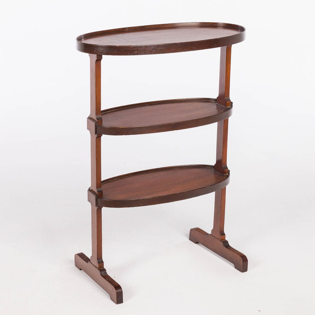 Louis XV Style Tricoteuse, 19th C: Property of Bliss Hebert and Allen Charles Klein Description: Louis XV Style Tricoteuse, 19th C, with oval tiers on a trestle form base. Measurements: Height: 30 3/4 in. x Width