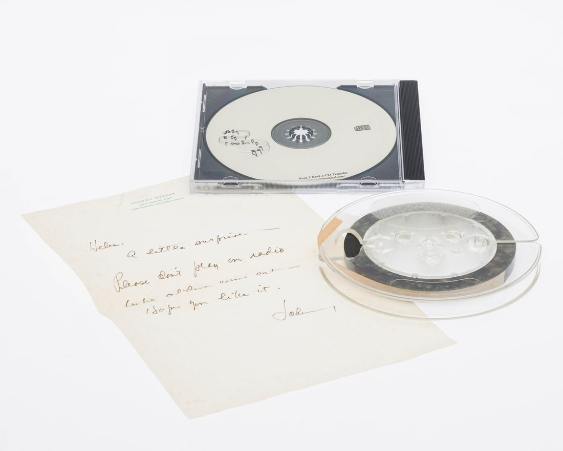 Johnny Mercer (Savannah, 1909-1976), Reel with Note: Description: Johnny Mercer (Savannah, 1909-1976), Reel with Note, audio reel with handwritten letter "Helen: A little surprise. Please don't play this on the radio until album comes out. Hope you