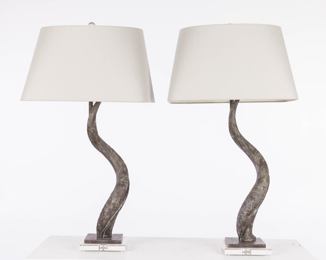 Pair of Faux Horn Lamps: Property of a Private Collector, St. Helena Island, SC Description: Pair of Faux Horn Lamps, mounted on a dark square base. Measurements: Height: 26 1/ 2in. x Width: 6 1/2 in. x Depth: 6 1/2 in.