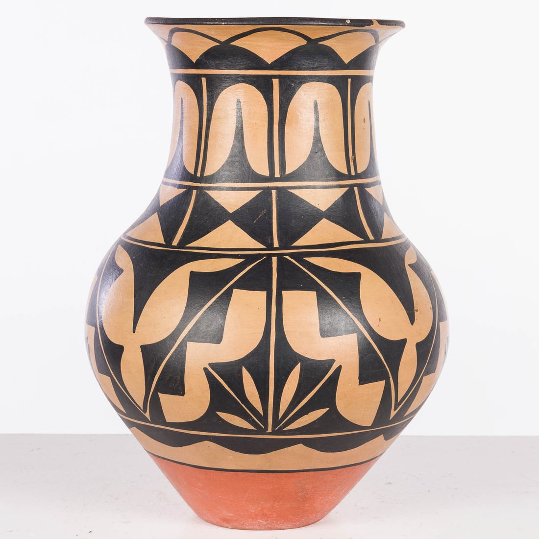 Large Kewa/Water Jar, 20th Century: Property of Bliss Hebert and Allen Charles Klein Description: Large Kewa/Water Jar, 20th Century, unsigned, with black and tan geometric motifs. Measurements: Height: 15 1/4 in.