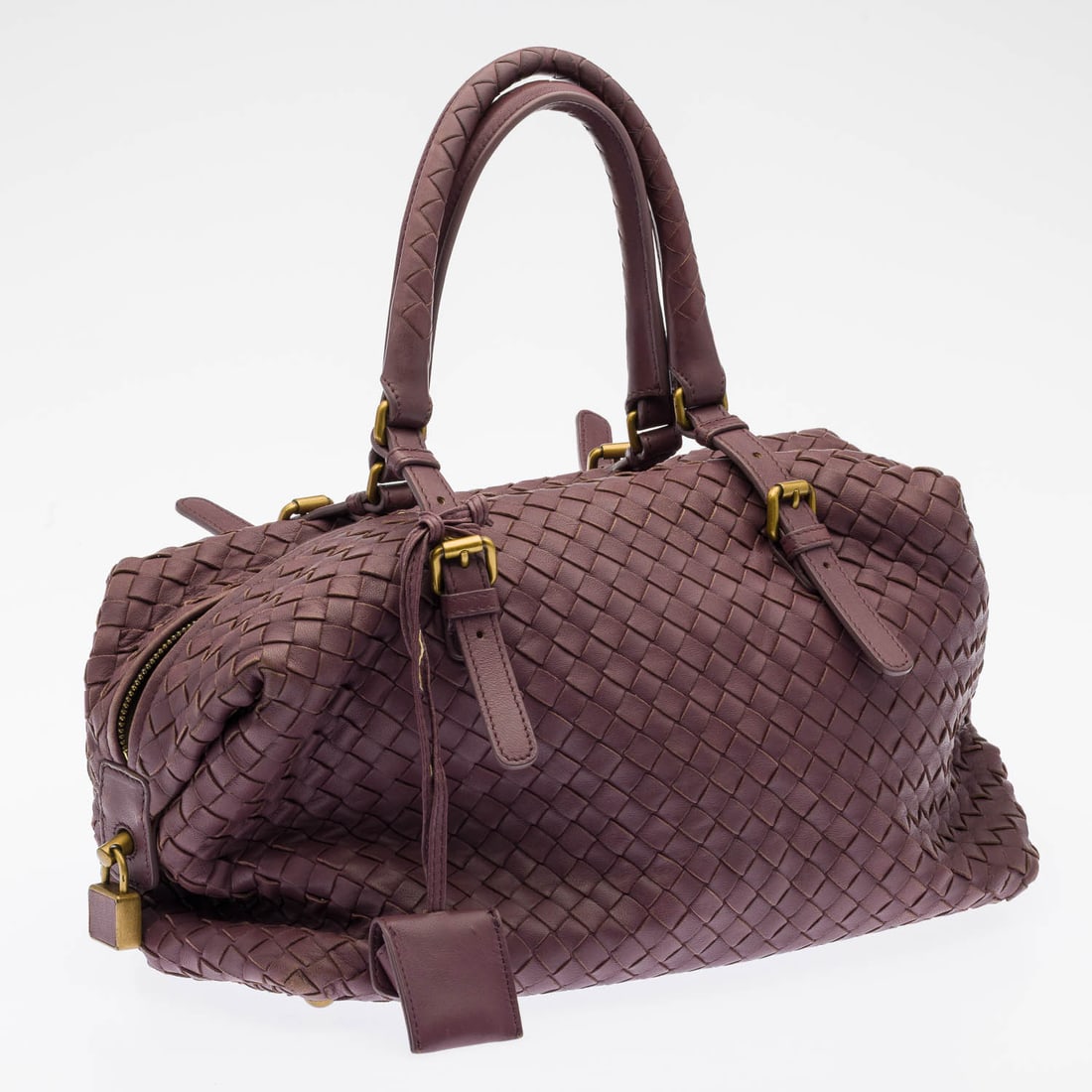 Bottega Veneta Montaigne Satchel: Description: Bottega Veneta Montaigne Satchel, with dual rolled leather top handles, adjustable buckle details and top-zip closure; suede interior with zip and slip pockets; together with pocket
