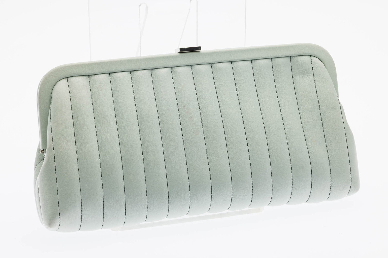 Chanel Mademoiselle Ligne Clutch Blue Lambskin: Property of a Private Collector, Savannah, GA Description: Chanel Mademoiselle Ligne Clutch Blue Lambskin, with vertical ribbed quilting, kiss-lock closure at the top; silver interior with brand