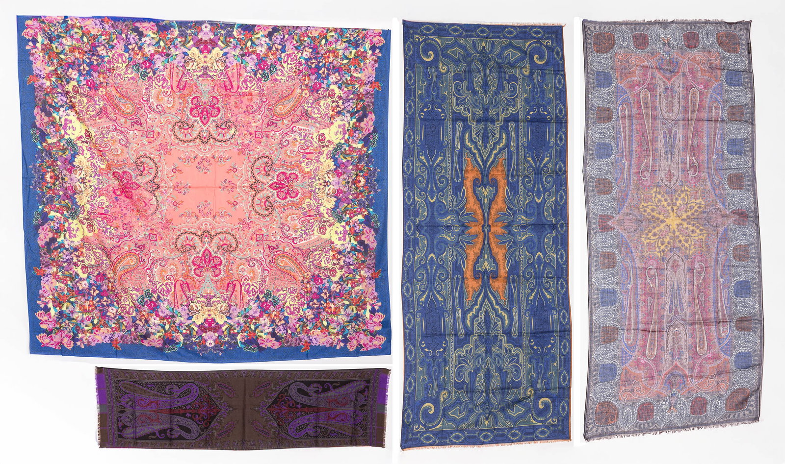 Four Etro Scarfs: Description: Four Etro Scarfs, comprising a paisley-patterned scarf in tones of burgundy, dark orange, blue, and cream, with tag (dimensions of the scarf: 64 in. x 26 1/2 in.); another in tones o