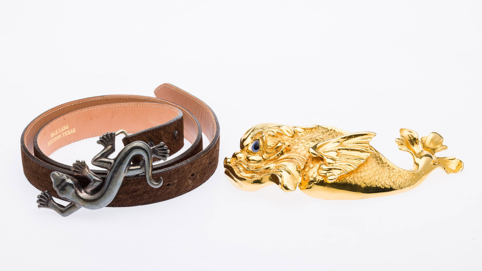 Max Lang and Christopher Ross Belt Buckle: Property from a St. Simons Island, GA Estate Description: Max Lang and Christopher Ross Belt Buckle, a large gilt-metal koi fish belt buckle, signed 'Christopher Ross, 1985' with thumb print at back,