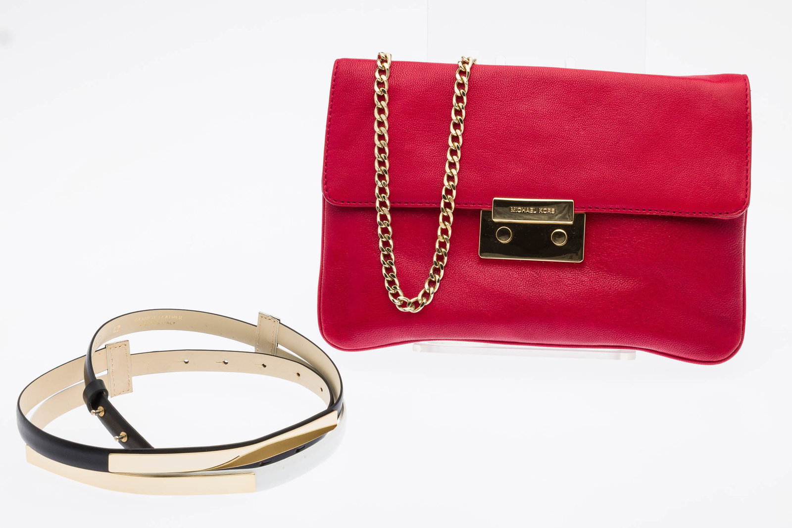 Michael Kors Red Purse and Leather Belt: Description: Michael Kors Red Purse and Leather Belt, comprising a Michael Kors leather wristlet clutch with a gold chain strap and gold hardware, with a push-lock closure, signature logo lining,