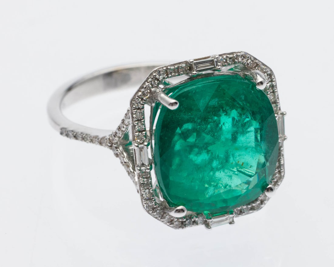Emerald (6.53 cts), Diamond & 14K Ring, GIA Cert: Description: Emerald (6.53 cts), Diamond and 14K Gold Ring, GIA Cert, Size 7.25, featuring a cushion Emerald (6.53 cts, 11.82 x 11.28 x 7.27 mm, clarity enhanced), surrounded by numerous round and