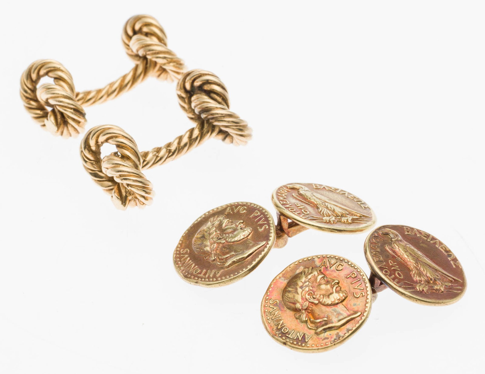 Two Pairs of 14K Gold Cufflinks: Property from a Private Collection, Jacksonville, FL Description: Two Pairs of 14K Gold Cufflinks, comprising a pair of knot-form cuff links, unmarked but tests 14K, and a pair of Roman coin cuff