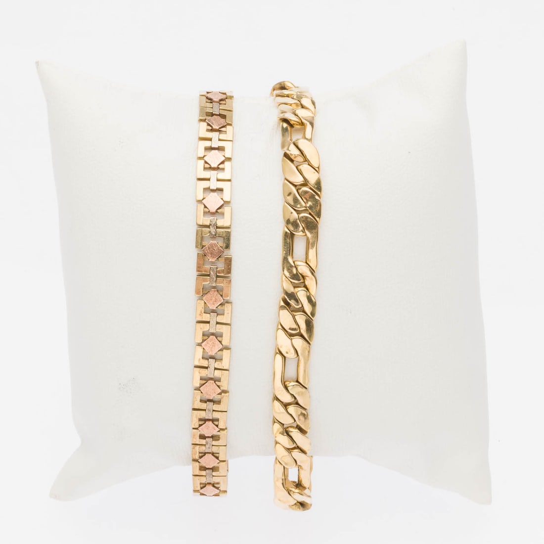 Two 14K Gold Chain Link Bracelets: Property of a Private Collector, Savannah, GA Description: Two 14K Gold Chain Link Bracelets, comprising a 7 3/4 in. gold box link bracelet with rose gold diamond designs, the box clasp marked 'It