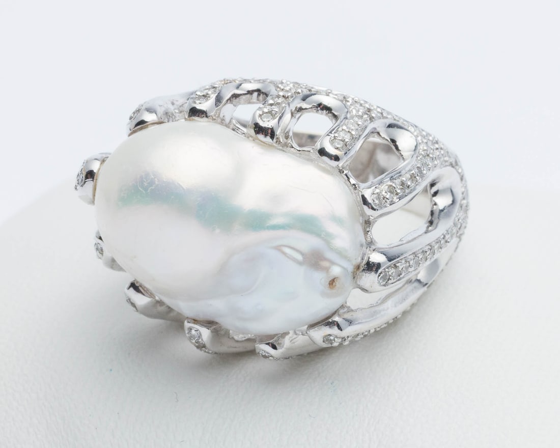 18K Gold, Baroque Pearl and Diamond Ring, Size 8: Description: 18K Gold, Baroque Pearl and Diamond Ring, Size 8, featuring a central baroque pearl custom set in 18K white gold with pave set diamonds (approx. 1.5 cts), marked '750' and 'Diva' on