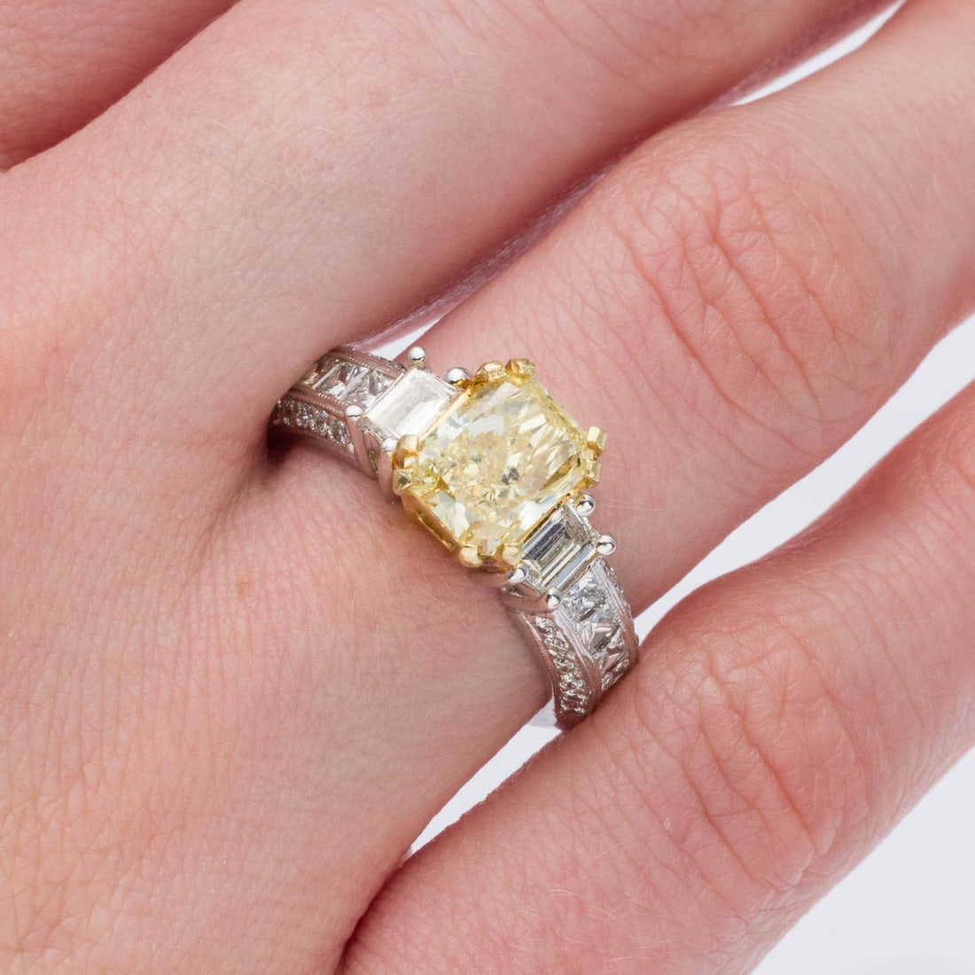 Fancy Yellow Diamond & 18K Gold Ring, GIA Cert, Sz 7: Description: Fancy Yellow Diamond and 18K Gold Ring, GIA Cert, Size 7, featuring a prong set cut-cornered rectangular modified brilliant fancy yellow diamond (7.83 x 6.08 x 4.18 mm, 1.91 cts), fl