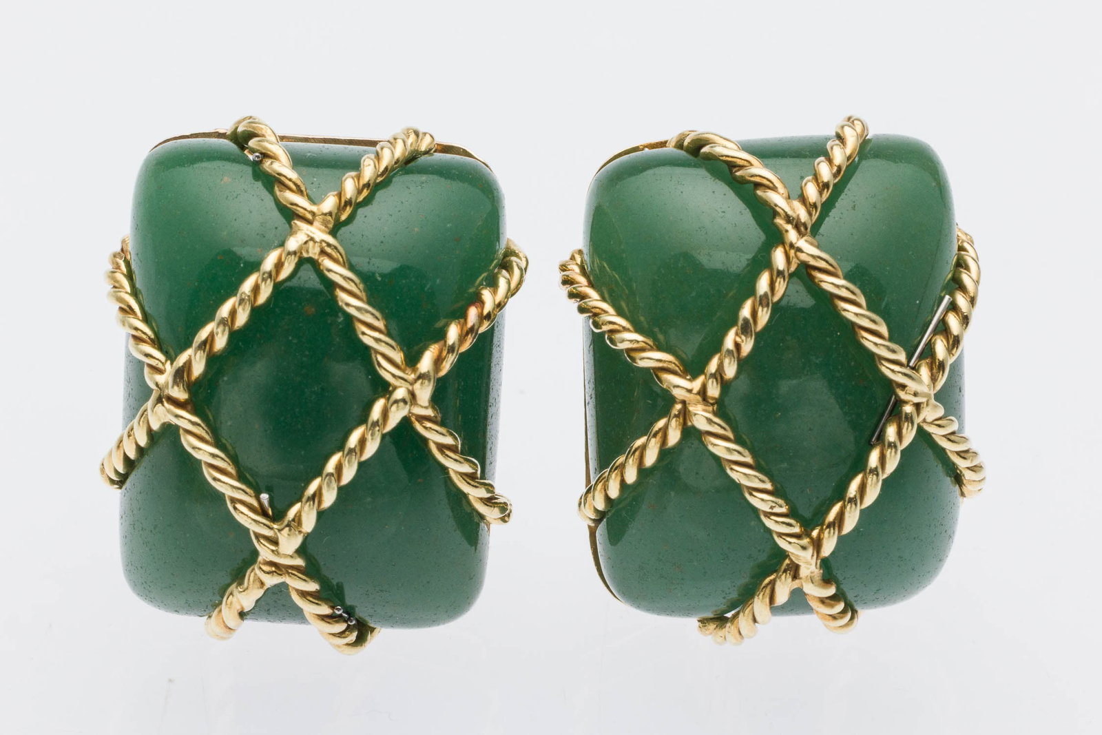 Seamon Schepps Nephrite and 18K Earrings: Description: Seamon Schepps Nephrite and 18K Earrings, 18K yellow gold post earrings featuring green nephrite rectangular cabochons with gold cage design overtop, one marked 'Seaman Schepps, 9139',