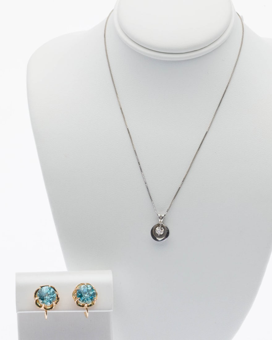 14K Gold & Topaz Earrings & 14K and Diamond Necklace: Property from a Private Collection, Jacksonville, FL Description: 14K Gold and Topaz Earrings and a 14K Gold and Diamond Necklace, comprising a pair of twist back clip earrings featuring approx. 8