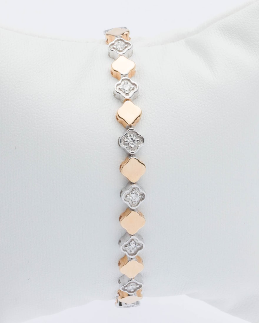 18K Rose and White Gold and Diamond Bracelet: Description: 18K Rose and White Gold and Diamond Bracelet, featuring alternating rose gold and white gold clover-form links, the white gold links set with round diamonds (approx. 0.86 cts) with box