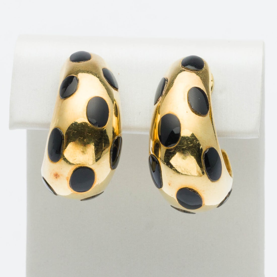 Pair of 18K Yellow Gold and Onyx Earrings: Property of a Private Collector, Savannah, GA Description: Pair of 18K Yellow Gold and Onyx Earrings, cuff earrings with onyx polka dots mounted in 18K yellow gold, with post and clip backs, unmarked
